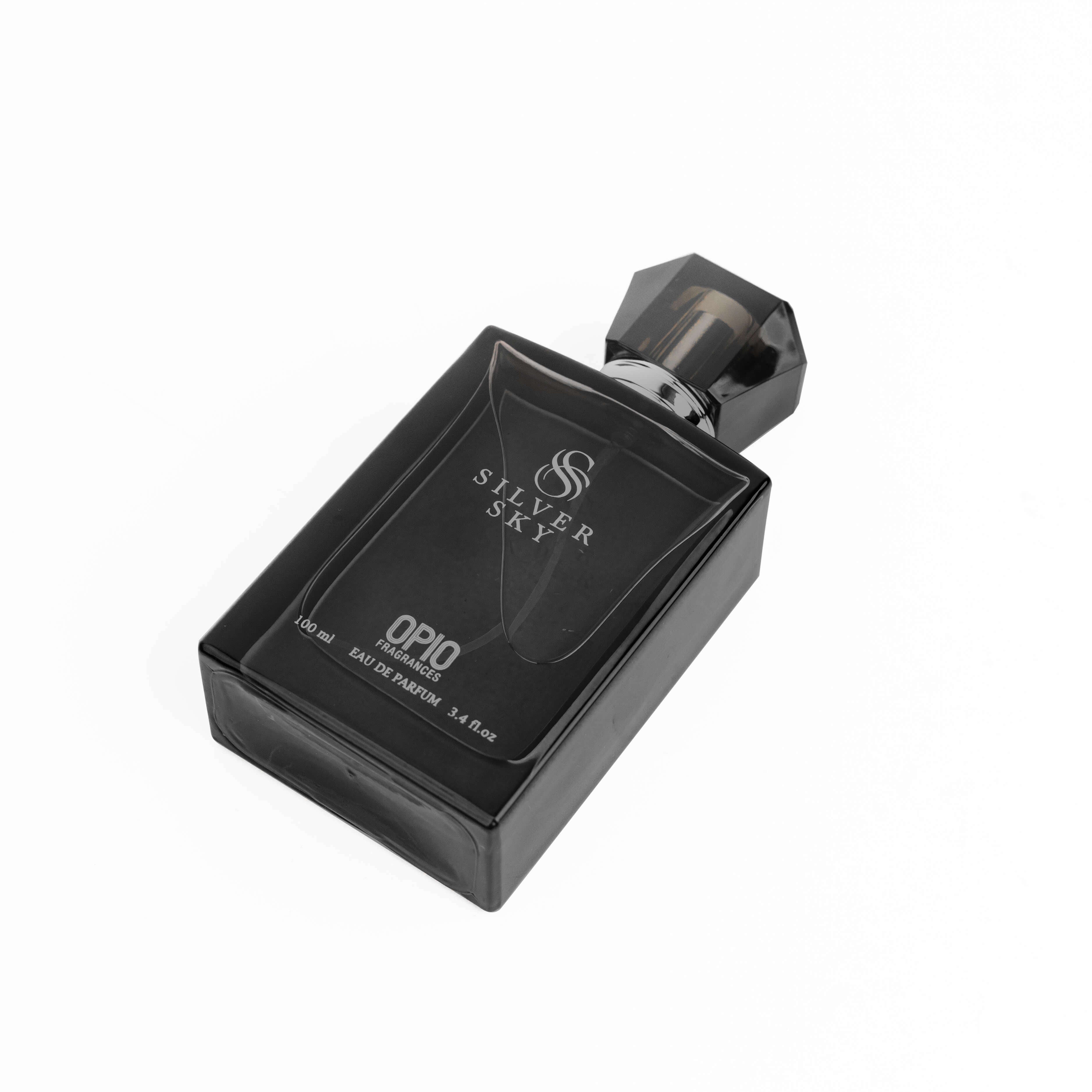 A 3ml mini perfume bottle labeled 'SILVER SKY' with a sample vial beside it, against a dark background.